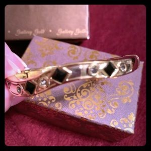 Gold black & diamond bangle bracelet.